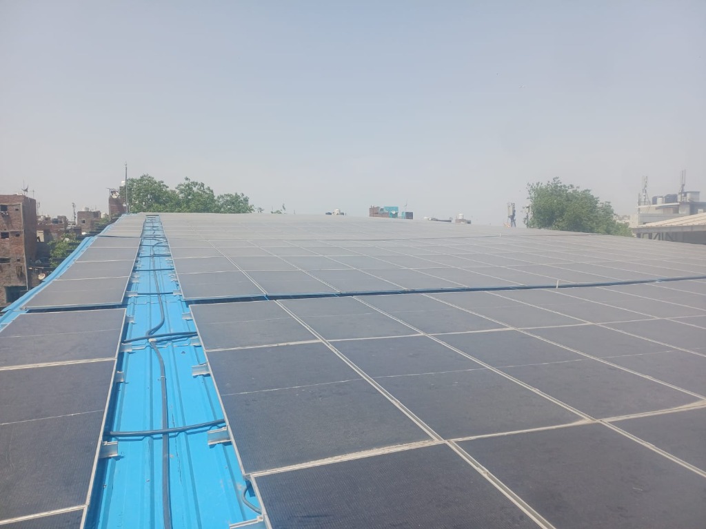 Completed rooftop solar panel installation on industrial building — Vykon Indus, Uttar Pradesh
